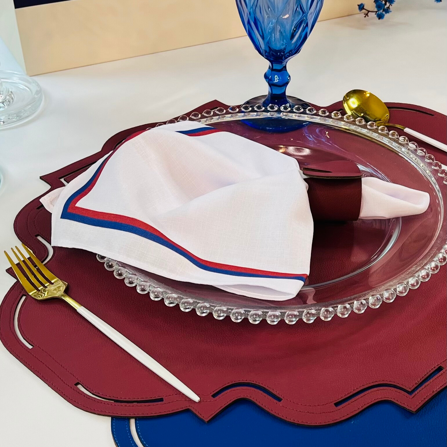 Marsala and Blue Napkin with Border